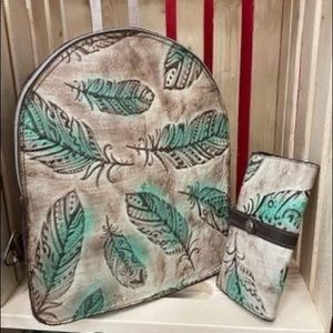 Handmade cowhide leather backpack and wallet set.